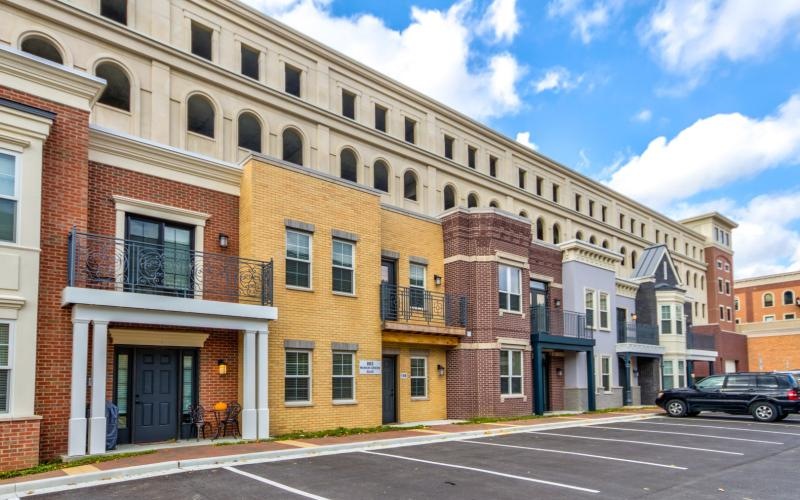 a large building with a parking lot