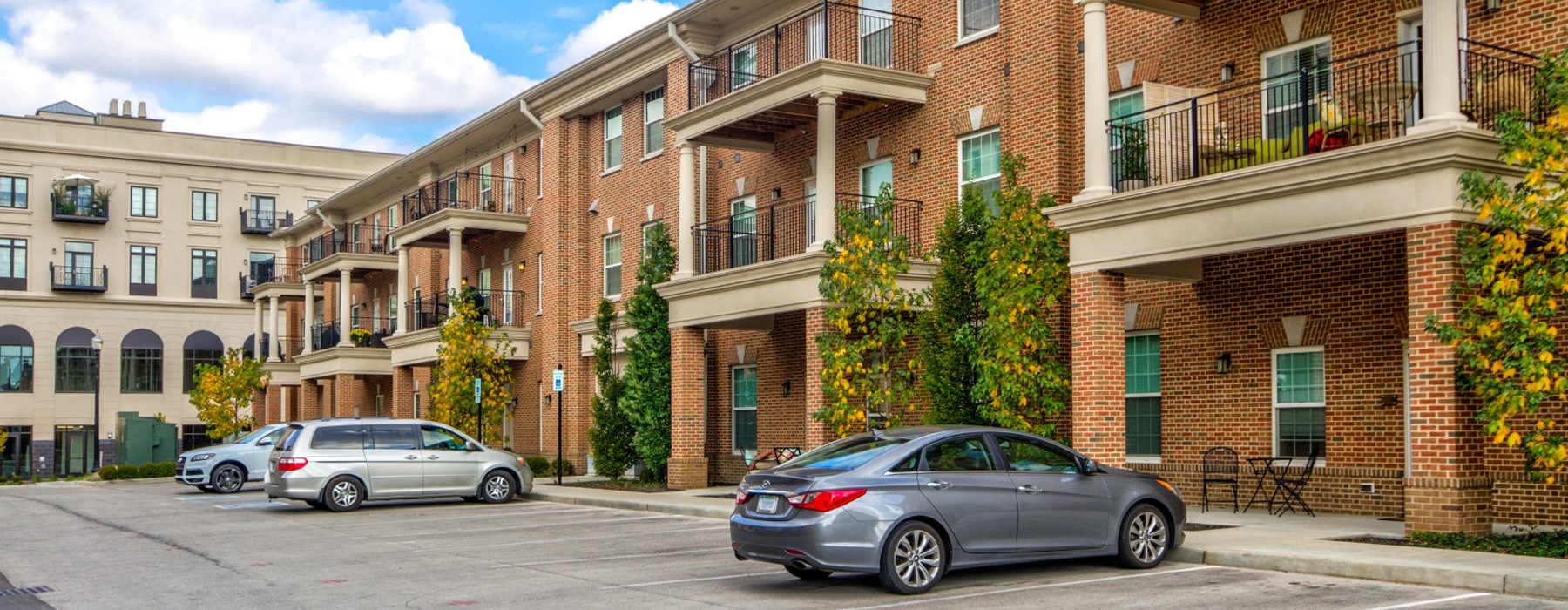 cars in front of a building